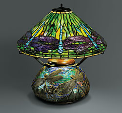 Fig. 2: Dragonfly shade, designed by Clara Driscoll in 1899, model 1462. Diam. 17 in. Arrowhead base, designed by Clara Driscoll in 1899, model 145. Courtesy McClelland + Rachen, New York. Clara Driscoll and the Tiffany Girls: The Women of Tiffany Studios by Margaret K. Hofer, Nina Gray, and Martin Eidelberg