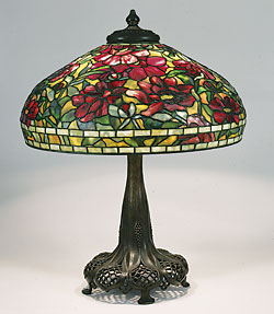 Fig. 4: Peony shade, designed by Clara Driscoll circa 1900-1904, model 1505. Diam.: 22 in. Base designed pre-1906, model 397. The New-York Historical Society, gift of Dr. Egon Neustadt. Photography by Glenn Castellano. Clara Driscoll and the Tiffany Girls: The Women of Tiffany Studios by Margaret K. Hofer, Nina Gray, and Martin Eidelberg