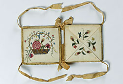 Puzzle purse with love token, American, circa 1830. Watercolor on paper inside a woven silk ribbon purse. 3-1/2 x 3-1/4 inches. Made for Love: Selections from the Jane Katcher Collection of Americana by Erin E. Eisenbarth