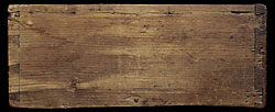 Fig. 5: Detail of drawer construction, illustrating the use of a wooden pin to secure the drawer side to the drawer bottom, on the MFA chest illustrated in fig. 3. A Taunton Chest Redivivus by Gerald W.R. Ward