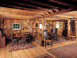 Click Here for Enlarged View Choice examples of country seating in the barn are used for entertaining, with a sawbuck table in one setting and a hutch table in another.