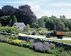 The wife's tea house is a repository of eighteenth-century furnishings from the couple's former New Hampshire farmhouse. The 1932 Ford BB farm truck from the couple's automobile collection is driven in parades and other celebratory occasions.