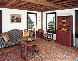 Click Here for Enlarged View The couple built the tea house based on a eighteenth-century design and techniques, and then filled it with period furniture and accessories. The butterfly drop-leaf table in the tea house is set with pewter from the couple's large collection.