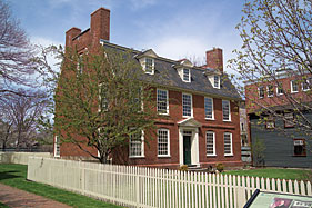 Fig. 3: Derby House, Salem (National Park Service) The Derby House was built as a testament to the wealth and good taste of the Derby family. This brick Georgian house was built by Captain Richard Derby in 1762 as a wedding present for his son, Elias Hasket Derby, who became one of Salems most successful merchants. At the time of construction, brick was a costly building material in New England. Richard Derbys choice of brick, large windows (glass was expensive), and a fashionable design with gambrel roof, proclaimed his familys status.
