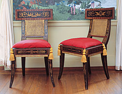 Click Here for Enlarged Version Pair of Side Chairs, 1808. Designed by Benjamin Henry Latrobe (1764-1820). Painted decoration attributed to George Bridport (1783-1819), Baltimore or Philadelphia. Paint, gold leaf, cane; maple, yellow-poplar, composition. Each: 34-1/2 x 20 x 20-1/2 inches (87.6 x 50.8 x 52.1 cm). The Bayou Bend Collection, museum purchase with funds provided by Agnes Cullen Arnold Endowment Fund, B.90.9.1–.2. Photography by Miguel Flores-Vianna.