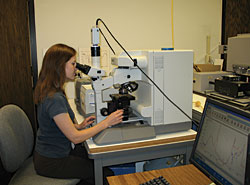 Winterthur associate scientist Catherine Matsen performing an infrared spectroscopy (FTIR) analysis of an eighteenth-century painted dower chest sample.  