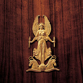 This beautiful depiction of the Greek goddess Nike (Victory) in ormolu adorns a small side table in the daughter's bedroom.