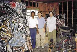 Thornton Dial, George Viener, and Bill Arnett in Dial’s Bessemer, Alabama, studio in 1992. Courtesy, Outsider Folk Art Gallery.  