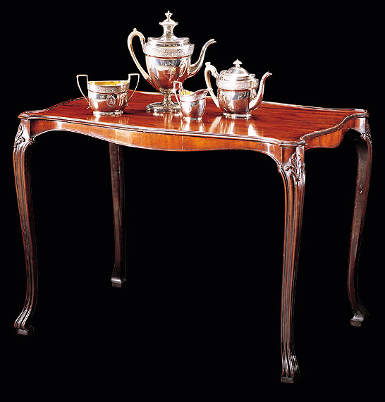 A Fine Serpentine Chippendale Silver Table