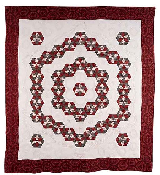 Stars in Hexagons Quilt with Trapunto Wreaths