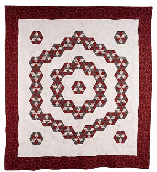 Stars in Hexagons Quilt with Trapunto Wreaths