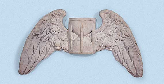 Winged, marble hourglass,