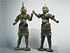 Pair of Dark Pottery Figures of Guardians