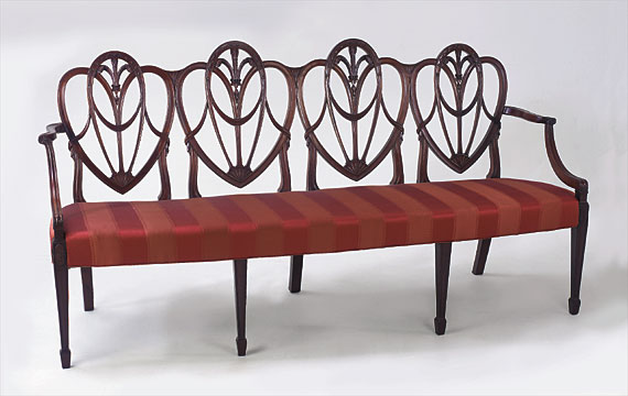 Hepplewhite Carved Mahogany Four Chair-back Settee