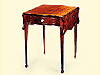 An Important Transitional Mahogany Pembroke Table