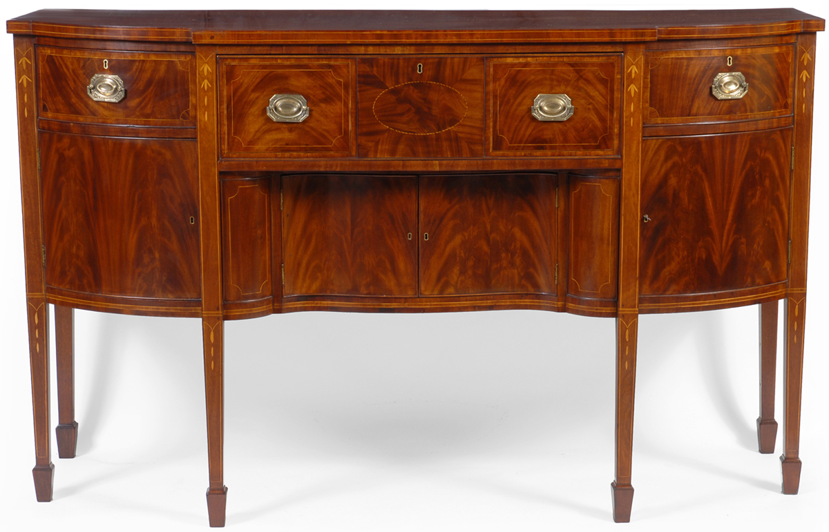 A superb Federal mahogany and inlaid sideboard, probably Newport, Rhode Island, circa 1810.