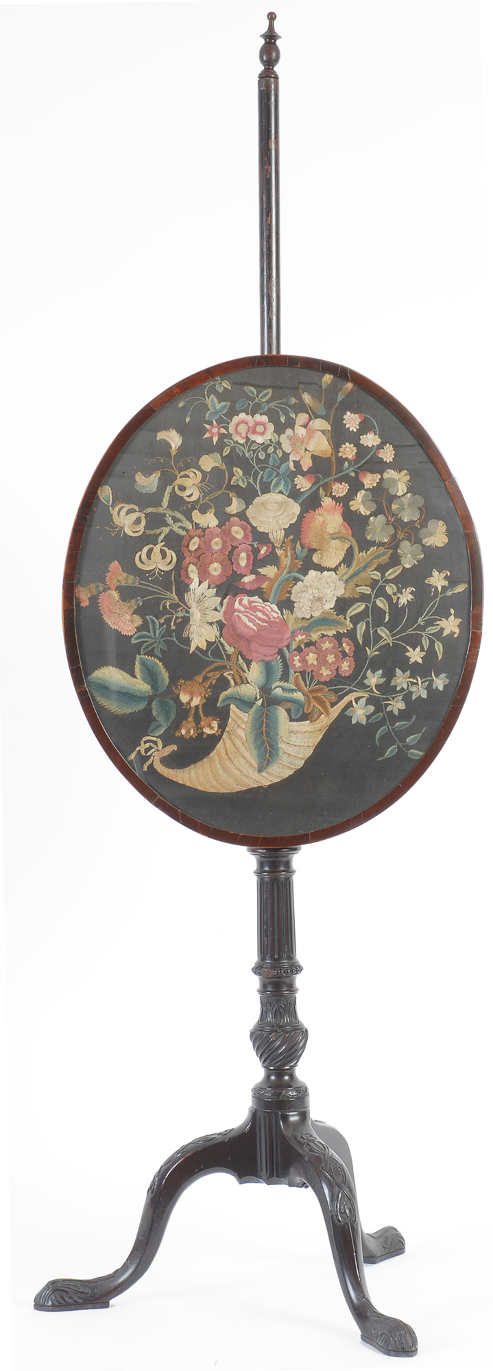 A fine Chippendale mahogany pole screen with oval panel, probably of British origin, but possibly American circa 1770.