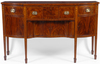 A superb Federal mahogany and inlaid sideboard, probably Newport, Rhode Island, circa 1810.